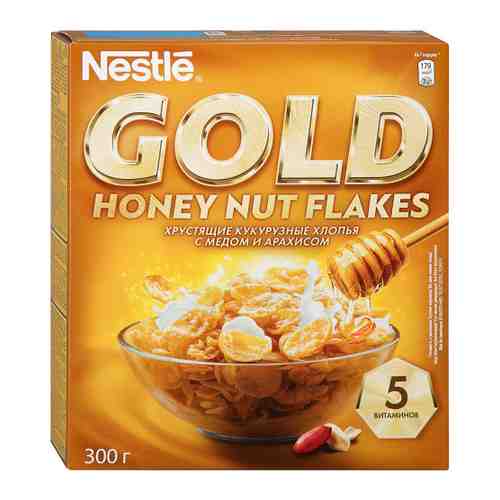 Хлопья Nestle Gold Flakes хрустящие кукурузные с медом и арахисом 300 г арт. 3235589